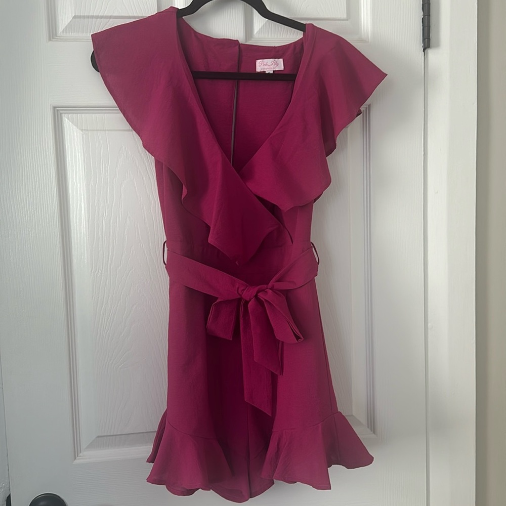Pink Lily pink romper. Size small. Never worn.